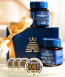 Haddrell's Manuka Honey jars with a decorative box on a light background